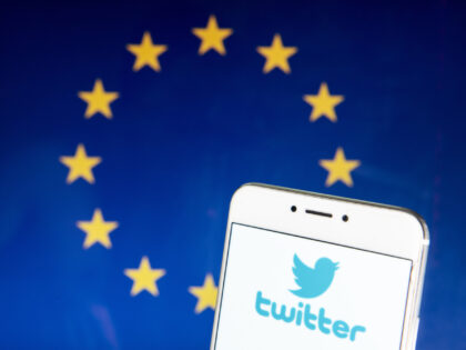 HONG KONG - 2019/04/21: In this photo illustration the American online news and social networking service Twitter logo is seen on an Android mobile device with the European Union flag in the background. (Photo Illustration by Budrul Chukrut/SOPA Images/LightRocket via Getty Images)