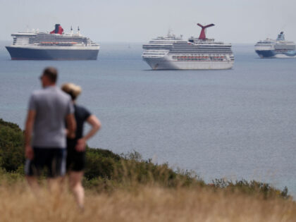 Cunard's Ocean liner Queen Mary 2 (left), and the cruise ships Carnival Valor and Marella Explorer 2 (right) in Portland, Dorset, as the cruise industry remains in lockdown due to the coronavirus pandemic. (Photo by Andrew Matthews/PA Images via Getty Images)