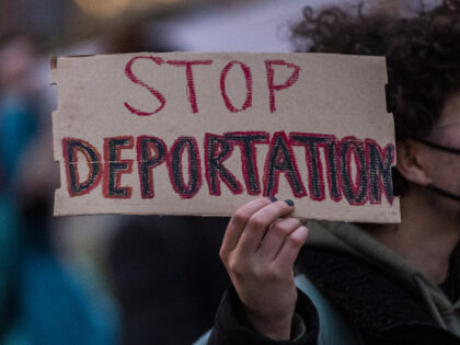 09 February 2022, Brandenburg, Schönefeld: Participants of a demonstration against the construction of a planned deportation center at Berlin Brandenburg Airport BER carry banners with the inscription "Stop deportation", among others. Photo: Christophe Gateau/dpa (Photo by Christophe Gateau/picture alliance via Getty Images)