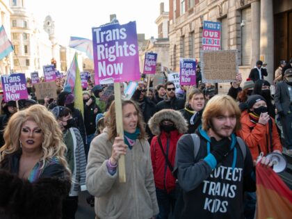 LONDON, UNITED KINGDOM - 2023/01/21: Protesters from the transgender community and their allies march along Whitehall towards Trafalgar Square during a rally in opposition to the governments triggering of Section 35. (Photo by Mike Ruane/SOPA Images/LightRocket via Getty Images)