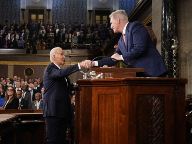 US President Joe Biden greets US House Speaker Kevin McCarthy, a Republican from California, right, while arriving to deliver the State of the Union address at the US Capitol in Washington, DC, US, on Tuesday, Feb. 7, 2023. Biden is speaking against the backdrop of renewed tensions with China and …