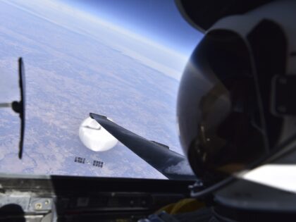 IN FLIGHT - FEBRUARY 03: (----EDITORIAL USE ONLY - MANDATORY CREDIT - "UNITED STATES DEPARTMENT OF DEFENSE / HANDOUT" - NO MARKETING NO ADVERTISING CAMPAIGNS - DISTRIBUTED AS A SERVICE TO CLIENTS----) U.S. Air Force pilot looks down at the suspected Chinese surveillance balloon as it hovered over the Central …