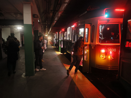 With most lights and elevator service out, passengers were greeted with an eerie scene at the Copley Square station on the MBTA Green Line. (Photo by Lane Turner/The Boston Globe via Getty Images)
