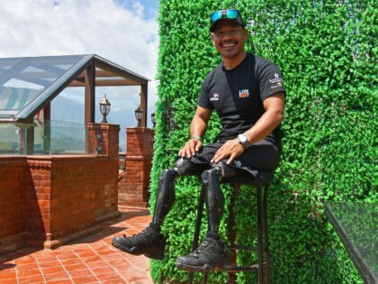 In this photograph taken on April 3, 2023, Gurkha veteran Hari Budha Magar poses during an interview with AFP in Kathmandu. - Hari Budha Magar grew up in the shadow of the Himalayas, but only after losing his legs did he resolve to make his childhood dream of scaling Everest …