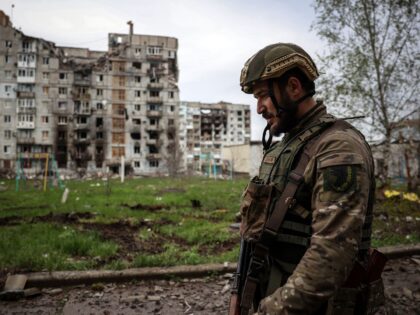 EDITORS NOTE: Graphic content / A Ukrainian serviceman walks near a residential building damaged by shelling in the frontline city of Bakhmut, Donetsk region, on April 23, 2023, amid the Russian invasion of Ukraine. (Photo by Anatolii Stepanov / AFP) (Photo by ANATOLII STEPANOV/AFP via Getty Images)