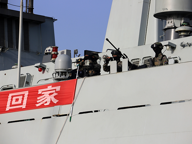 Members of the People's Liberation Army PLA Navy Marine Corps stand guard at the evacuation site, April 26, 2023. Two Chinese navy vessels have successfully evacuated a first batch of 678 people from Sudan, who arrived at the Saudi Arabian port of Jeddah at around 3 p.m. Thursday Beijing time, …