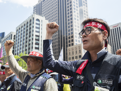 Members of Korean Trade Unions held rallies at Gwanghwamun Square on International Workers' Day, protesting against labor reforms pursued by the Yoon Suk Yeol government in Seoul, South Korea on May 01, 2023. (Photo by Kim Jong Hyun/Anadolu Agency via Getty Images)