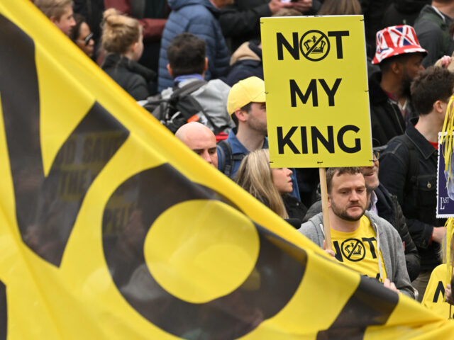 LONDON, ENGLAND - MAY 06: Protesters hold up placards reading "Not My King" in Trafalgar S