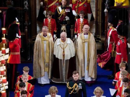 LONDON, ENGLAND - MAY 06: King Charles III arrives for his coronation, followed by Prince George, at Westminster Abbey, on May 6, 2023 in London, England. The Coronation of Charles III and his wife, Camilla, as King and Queen of the United Kingdom of Great Britain and Northern Ireland, and …