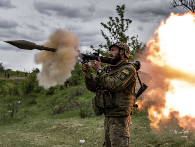 DONETSK, UKRAINE - MAY 08: A soldier fires a rocket gun as Ukrainian soldiers in the Donet