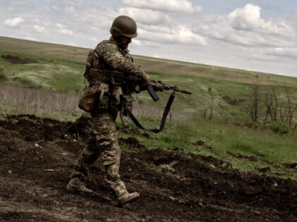 DONETSK, UKRAINE - MAY 11: An Ukrainian soldier controls his gun at training camp amid Russia-Ukraine war in Donetsk, Ukraine on May 11, 2023. The country's most intense clashes continue in Donetsk. (Photo by Vincenzo Circosta/Anadolu Agency via Getty Images)