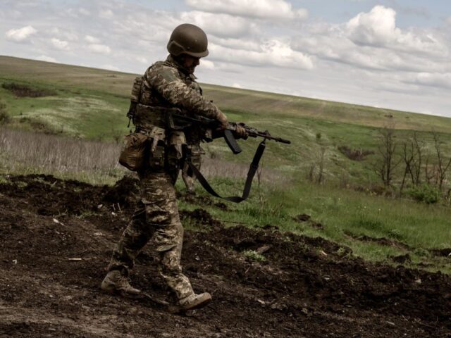 DONETSK, UKRAINE - MAY 11: An Ukrainian soldier controls his gun at training camp amid Rus