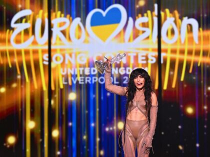 dpatop - 14 May 2023, Great Britain, Liverpool: Loreen from Sweden cheers with the trophy on stage after her victory in the final of the 67th Eurovision Song Contest (ESC) at the M&S Bank Arena. Singer Loreen has won the Eurovision Song Contest for Sweden for the second time after …