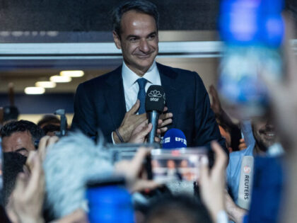 Kyriakos Mitsotakis, Greece's prime minister and leader of New Democracy party, speaks to supporters outside the party's headquarters following Greece's general election, in Athens, Greece, on Sunday, May 21, 2023. Mitsotakis is poised to win the most votes in Greece's general election on Sunday, but he'll likely fall short of the …