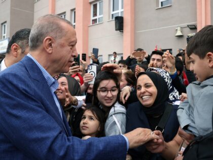 ISTANBUL, TURKIYE - MAY 28: Turkish President Recep Tayyip Erdogan speaks with citizens as he casts his vote for the second round of Turkiye's presidential elections at the polling station in Ankara, Turkiye on May 28, 2023. Millions of voters started heading to the polls in Turkiye as the country's …