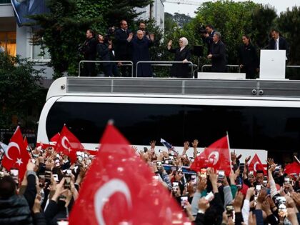 Turkish President Recep Tayyip Erdogan waves to supporters as he claims victory in the Turkish presidential election runoff outside the president's residence in kisikli on May 28, 2023 in Istanbul, Turkey. President Erdogan was forced into a runoff election when neither he nor his main challenger, Kemal Kilicdaroglu of the …