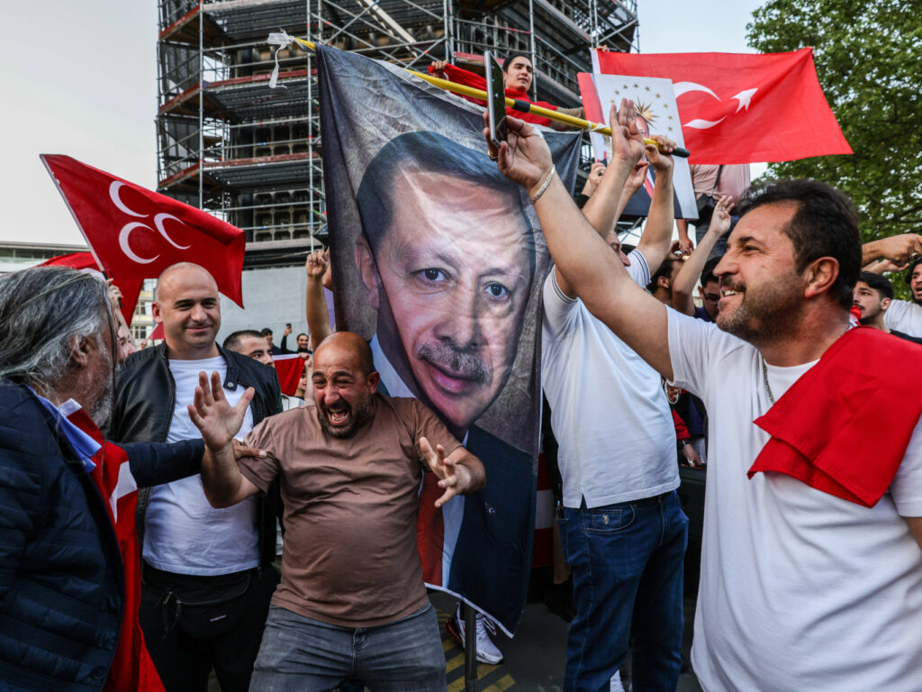 BERLIN, GERMANY - MAY 28: Local Turkish people celebrate along the Kurfürstendamm avenue, the preliminary results in Turkey's general election run-off that indicate a win for Recep Tayyip Erdogan on May 28, 2023 in Berlin, Germany. Germany is home to Turkey's largest diaspora, a high percentage of whom turned out to vote in elections pitting Turkish President Recep Tayyip Erdogan against economist and opposition challenger Kemal Kilicdaroglu. (Photo by Omer Messinger/Getty Images)
