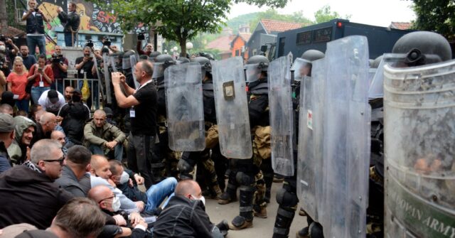 Rioters Attack NATO Soldiers, Spray-Paint Russian 'Z' Symbol on Vehicles