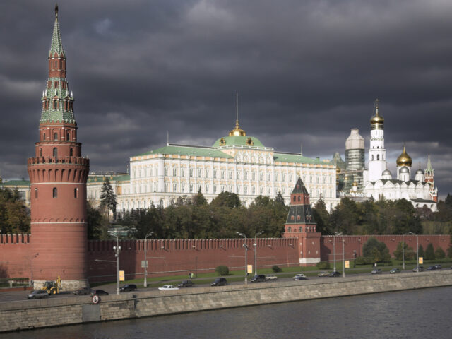 Walls of the Kremlin with the Grand Kremlin Palace and Cathedral behind, Moscow, Russia