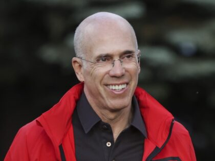 Jeffrey Katzenberg, film producer, walks to a morning session during the Allen & Company S
