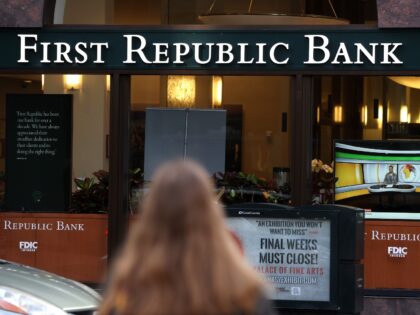 SAN FRANCISCO, CALIFORNIA - APRIL 26: A pedestrian crosses the street by a First Republic bank on April 26, 2023 in San Francisco, California. Shares of San Francisco-based bank First Republic continue to fall as the New York Stock Exchange halted trading of the stock at least a dozen times …