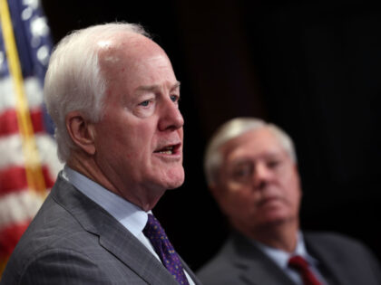 WASHINGTON, DC - MAY 03: U.S. Sen. John Cornyn (R-TX), joined by Sen. Lindsey Graham (R-SC), speaks on Title 42 immigration policy on May 03, 2023 in Washington, DC. The group of Republican Senators spoke out against the expiration of Title 42 saying it would be detrimental for southern states …