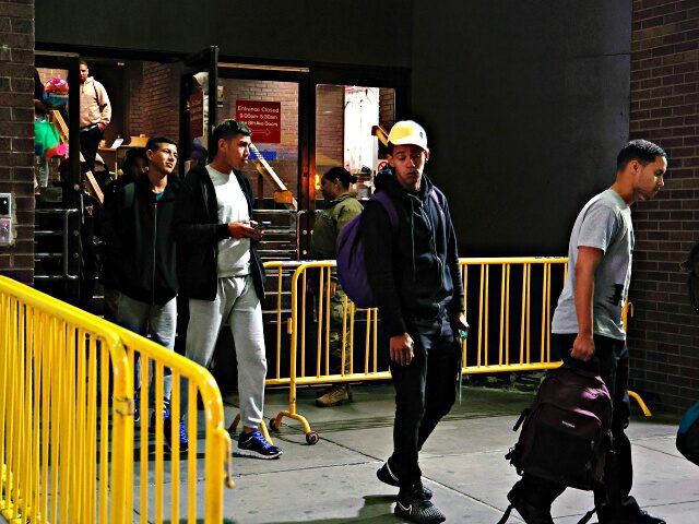 NEW YORK, NEW YORK - MAY 15: Asylum seekers are transferred via city bus from Port Authority bus terminal to housing facilities in the Bronx and Queens on May 15, 2023 in New York City. After arriving from the Texas/Mexico border and being processed by New York City officials, the …