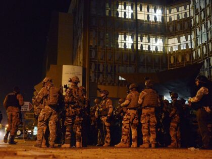 French special forces take position by the Labour Ministry building in the surroundings of the Splendid hotel and a restaurant during an attack on both the hotel and restaurant by Al-Qaeda linked gunmen early on January 16, 2016 in Ouagadougou. Burkina Faso troops supported by French special forces were battling …