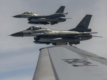 EINDHOVEN, NETHERLANDS - APRIL 12: Dutch Air Force F-16 fighters fly near a Dutch Air Force KDC10 tanker after having been refueled over the North Sea during press day of European Air Transport Command (EATC) European Air Refueling Training 2018 on April 12, 2018 in Eindhoven, Netherlands. Refueling of 8 …