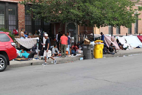 A group of mostly Venezuelan migrants camp out on the streets of El Paso as mayor declares second border related emergency in six months. (Randy Clark/Breitbart Texas