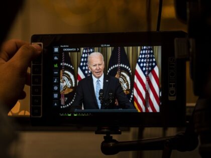 U.S. President Joe Biden displayed on a television camera monitor while speaking on the Ma