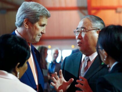 FILE - Secretary of State John Kerry, left, talks with China's Special Representative on Climate Change Xie Zhenhua prior to the opening of the COP21 conference in Le Bourget, France, Dec. 12, 2015. Kerry, President Barack Obama's secretary of state and a former senator, came back post-President Donald Trump to …