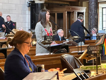 Sen. Kathleen Kauth of Omaha, a freshman lawmaker, speaks, Friday, May 19, 20230, in Lincoln, Nebraska, during debate on a bill that would ban gender-affirming care to minors. Kauth introduced the bill – which has been the flashpoint this session. Omaha Sen. Machaela Cavanaugh, foreground, led an effort to filibuster …