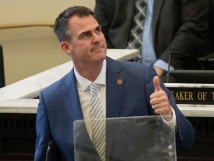 Oklahoma Gov. Kevin Stitt gestures as he delivers his State of the State address Monday, Feb. 6, 2023, in Oklahoma City.