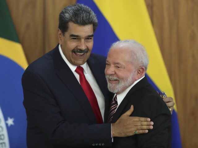 Venezuela's President Nicolas Maduro, left, and Brazilian President Luiz Inacio Lula da Silva end a press conference at Planalto palace in Brasilia, Brazil, Monday, May 29, 2023. Maduro is in Brazil for the summit by the Union of South American Nations (UNASUR) that starts on Tuesday. (Gustavo Moreno/AP)