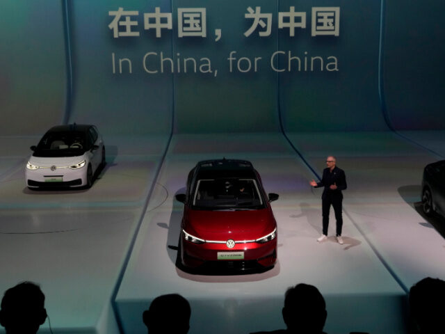 CEO of Volkswagen China Passenger Cars Brand Stefan Mecha unveils the ID.7 Vizzion, its ne