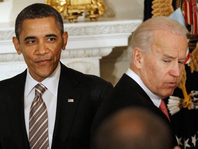 WASHINGTON, DC - FEBRUARY 27: U.S. President Barack Obama (L) is introduced by Vice Presid