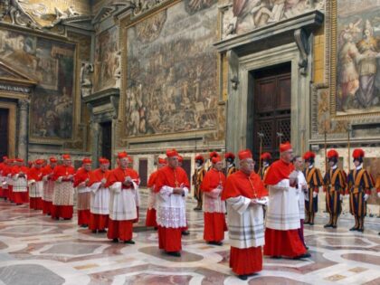 In this photo from files taken on April 18, 2005 and released by the Vatican paper L'Osservatore Romano, Cardinals walk in procession to the Sistine Chapel at the Vatican, at the beginning of the conclave. Next month's conclave to elect the 266th leader of the world's 1.2 billion Catholics will …