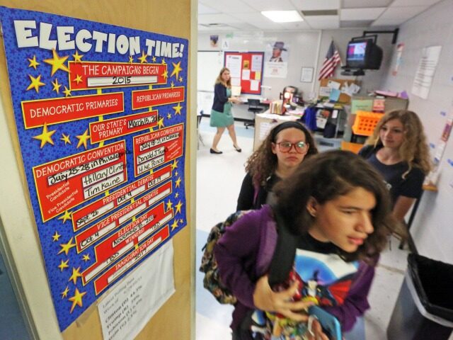 Millennium Middle School seventh grade civics class students rush out of class Tuesday, Oc