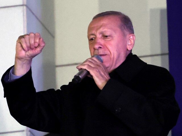 Turkish President Tayyip Erdogan addresses supporters at the AK Party headquarters after polls closed in Turkey's presidental and parliamentary elections in Ankara, Turkey May 15, 2023. Turkey is braced for its first election runoff after a night of high drama showed President Recep Tayyip Erdogan edging ahead of his secular …
