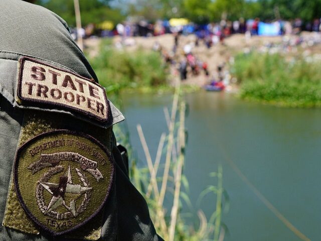 Texas DPS trooper stands ready at state's border with Mexico to deter and turnback migrant