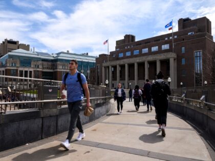 MINNEAPOLIS, MN - APRIL 9: A pedestrian passes by on the University of Minnesota campus on