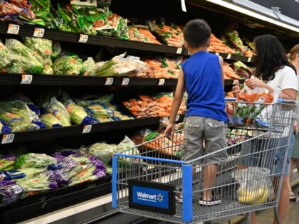 Consumers shop in the produce section of a Walmart store in Burbank, California on August 15, 2022. - Walmart, the largest retailer the United States, will report second quarter earnings on August 16, 2022. (ROBYN BECK/AFP via Getty)