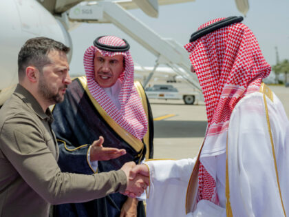 In this photo provided by Saudi Press Agency, SPA, Ukraine's President Volodymyr Zelenskyy, left, is greeted by Prince Badr Bin Sultan, deputy governor of Mecca, upon his arrival at Jeddah airport, Saudi Arabia, Friday, May 19, 2023, to attend the Arab summit. (Saudi Press Agency via AP)