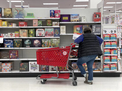 SAN FRANCISCO, CALIFORNIA - DECEMBER 15: A Target customer looks at a display of board games while shopping at Target store on December 15, 2022 in San Francisco, California. According to a report by the U.S. Commerce Department, retail sales fell 0.6% in November as consumers pulled back on spending …