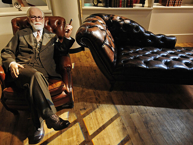 A wax likeness of Austrian founder of the psychoanalysis Sigmund Freud sits in Berlin&#039