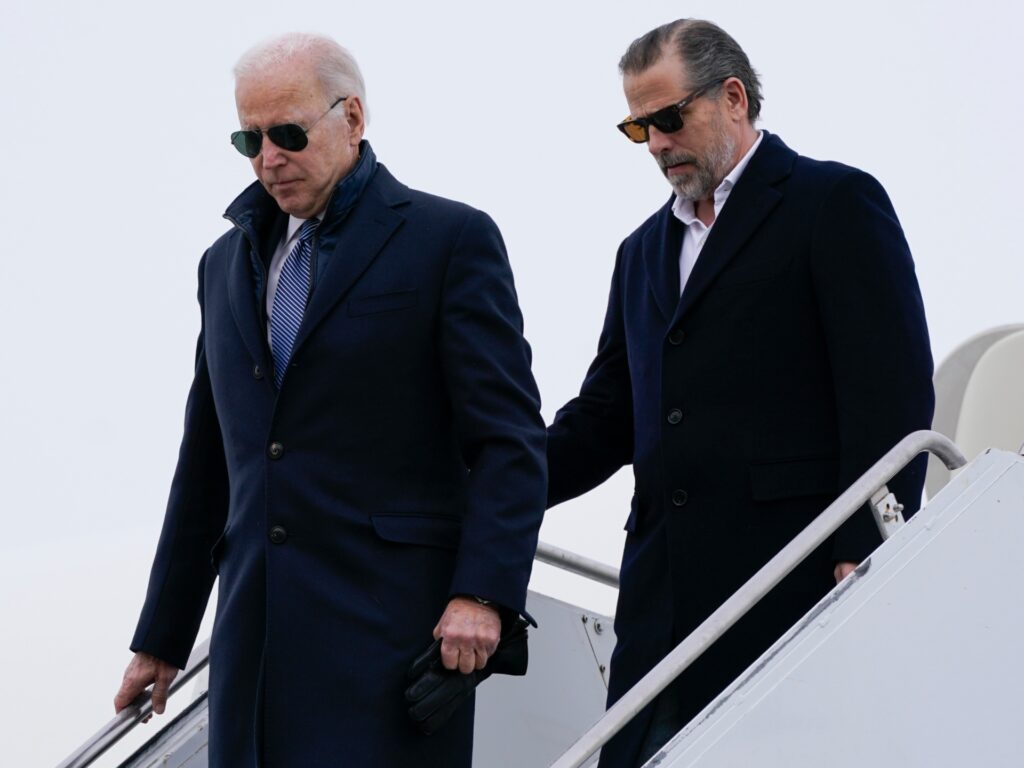 President Joe Biden and his son Hunter Biden step off Air Force One, Saturday, Feb. 4, 2023, at Hancock Field Air National Guard Base in Syracuse, N.Y. The Bidens are in Syracuse to visit with family members following the passing of Michael Hunter, the brother of the president's first wife, Neilia Hunter Biden. (AP Photo/Patrick Semansky)