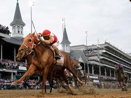 Rich Strike, with Sonny Leon aboard, crosses the finish line to win the 148th running of the Kentucky Derby horse race at Churchill Downs Saturday, May 7, 2022, in Louisville, Ky. Rich Strike's stunning upset victory in last year's Kentucky Derby as a nearly 81-1 long shot provided the race's …