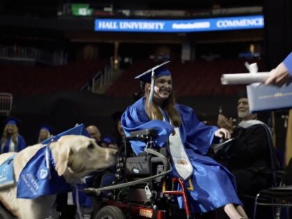 service-dog wins diploma