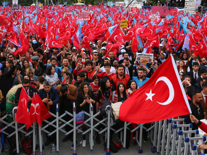 Supporters of Turkish CHP party leader and Nation Alliance's presidential candidate Kemal Kilicdaroglu wave Turkish flags during an election campaign rally in Ankara, Turkey, Friday, May 12, 2023. Turkey is heading toward presidential and parliamentary elections on Sunday. (AP Photo/Ali Unal)